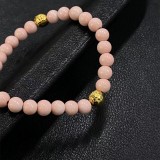 CHROME HEARTS Pink 6MM Bead Bracelet with 2 Gold Beads & Cross Charm