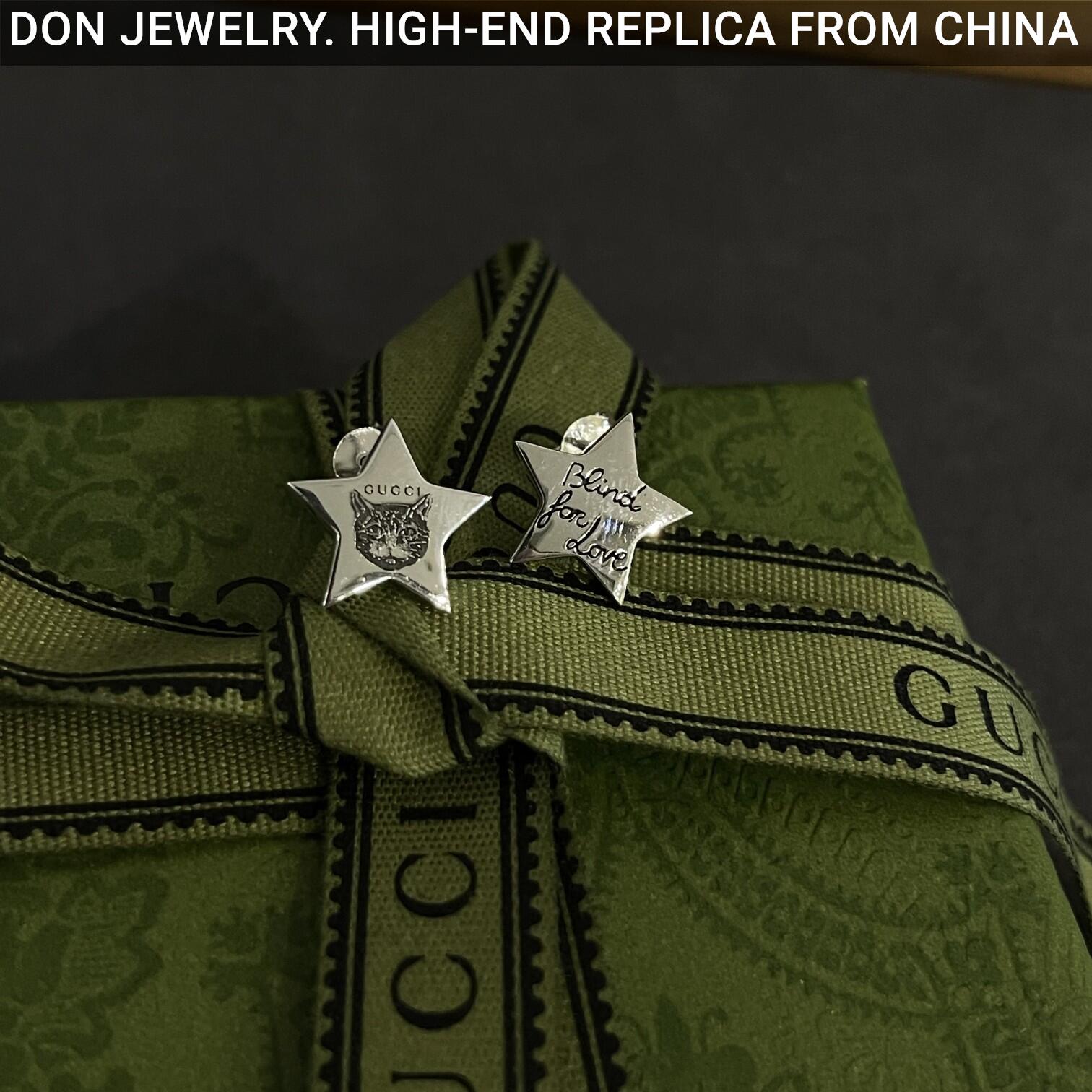 GUCCI Blind for Love Star earrings